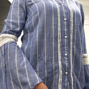 Light blue blouse with long sleeves